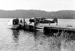 Leithold Plane Moored to Dock, Windigo, ca. 1945: [NVIC: 40-359], ISRO Archives.