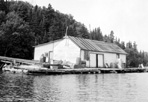 Singer's Warehouse and Dock, ca. 1955: ISRO Archives. [NVIC: 50-1158].